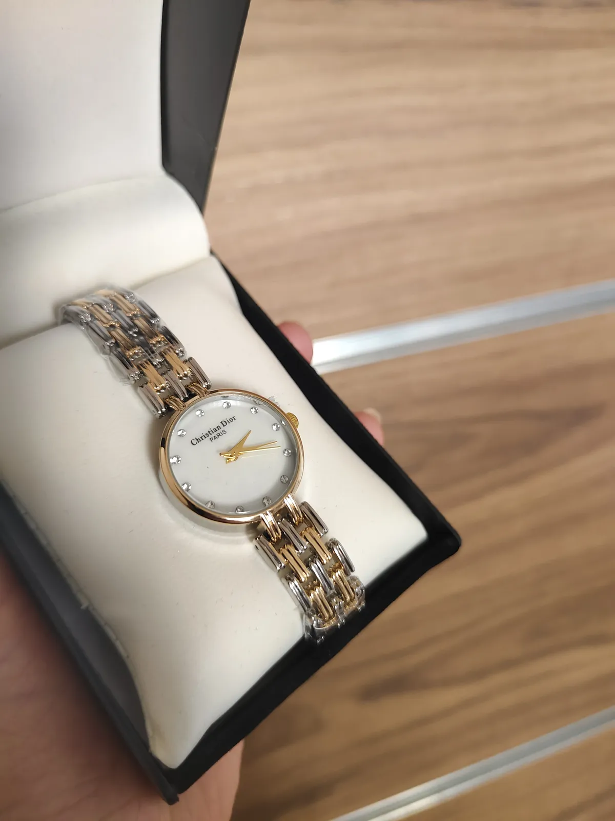 Montre Christian Dior argenté dorée